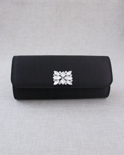 black satin wedding clutch with brooch