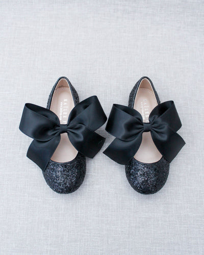 Black glitter shoes with bow