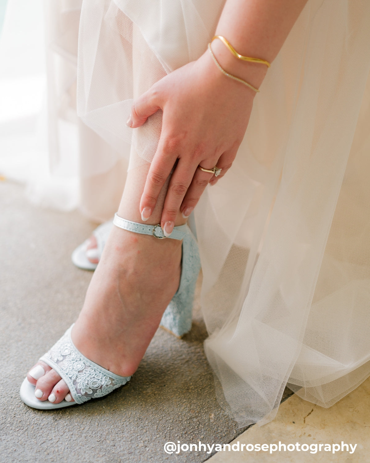 lace wedding dress with blue shoes And Something Blue | Show off your shoes! This square-neck satin gown with a high front slit is a modern choice, balanced by a beautiful, flowing lace-trimmed...