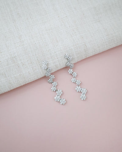 silver floral-shaped rhinestones long dangled earring