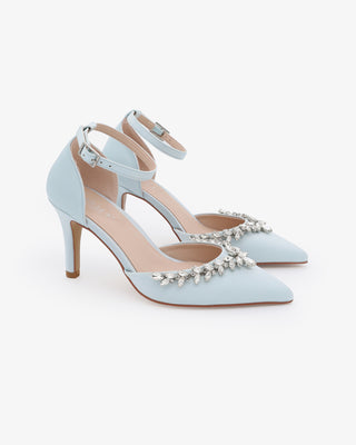 Light blue satin wedding heels with pointed closed toe and starlet rhinestone embellishment, perfect for bridal or formal occasions