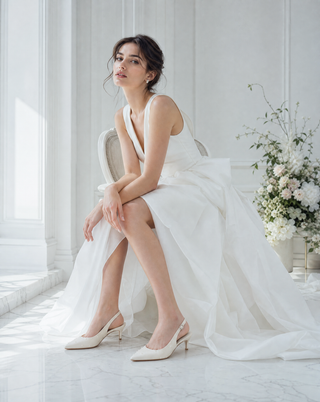 Ivory satin pointy toe kitten heel slingback pumps with Scattered Pearls embellishment