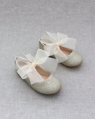 Gold glitter shoes with bow