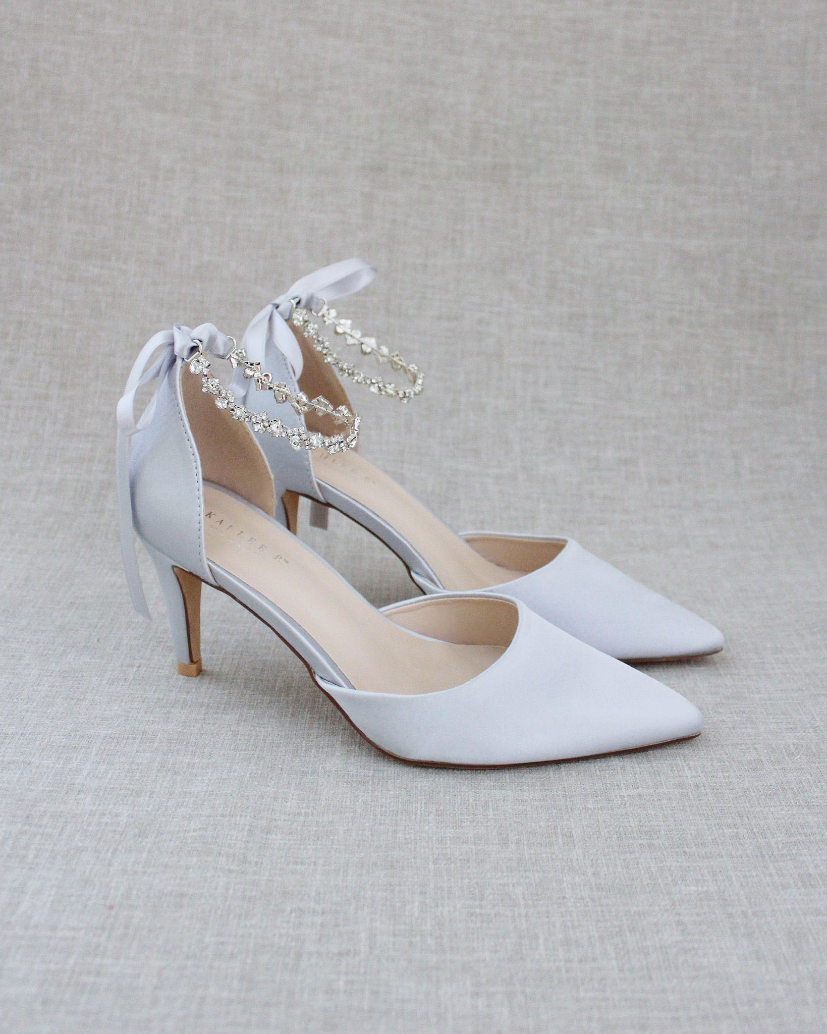 Silver evening pumps deals