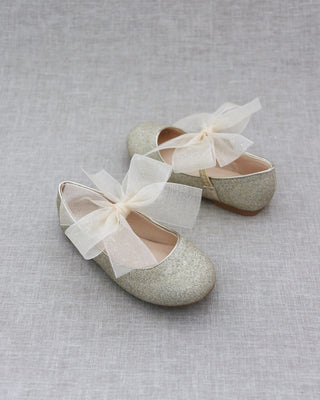 Gold glitter shoes with bow