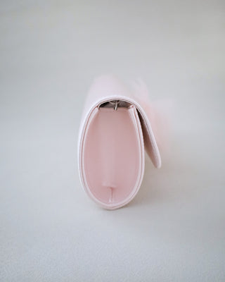 dusty pink satin wedding clutch with tulle bow