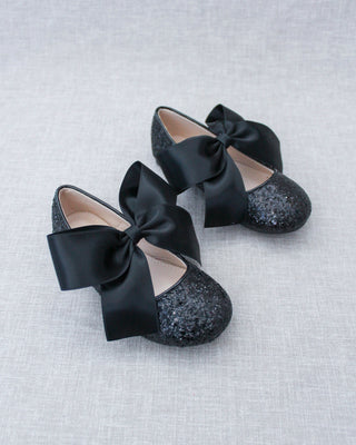 Black glitter shoes with bow