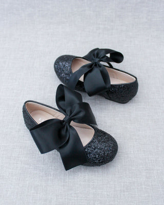 Black glitter shoes with bow