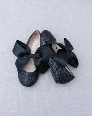 Black glitter shoes with bow