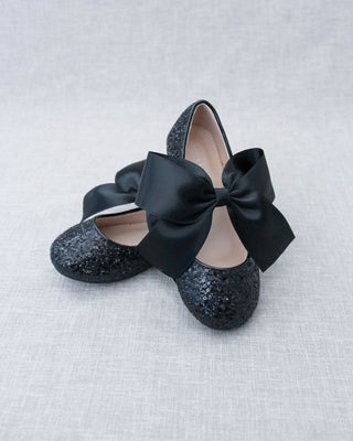 Black glitter shoes with bow