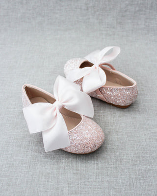Pink glitter flats with bow