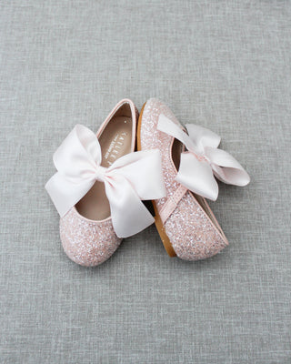 Pink glitter shoes with bow