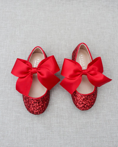 Red glitter shoes with bow