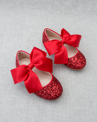 Red glitter shoes with bow