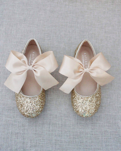 Gold glitter flats with bow