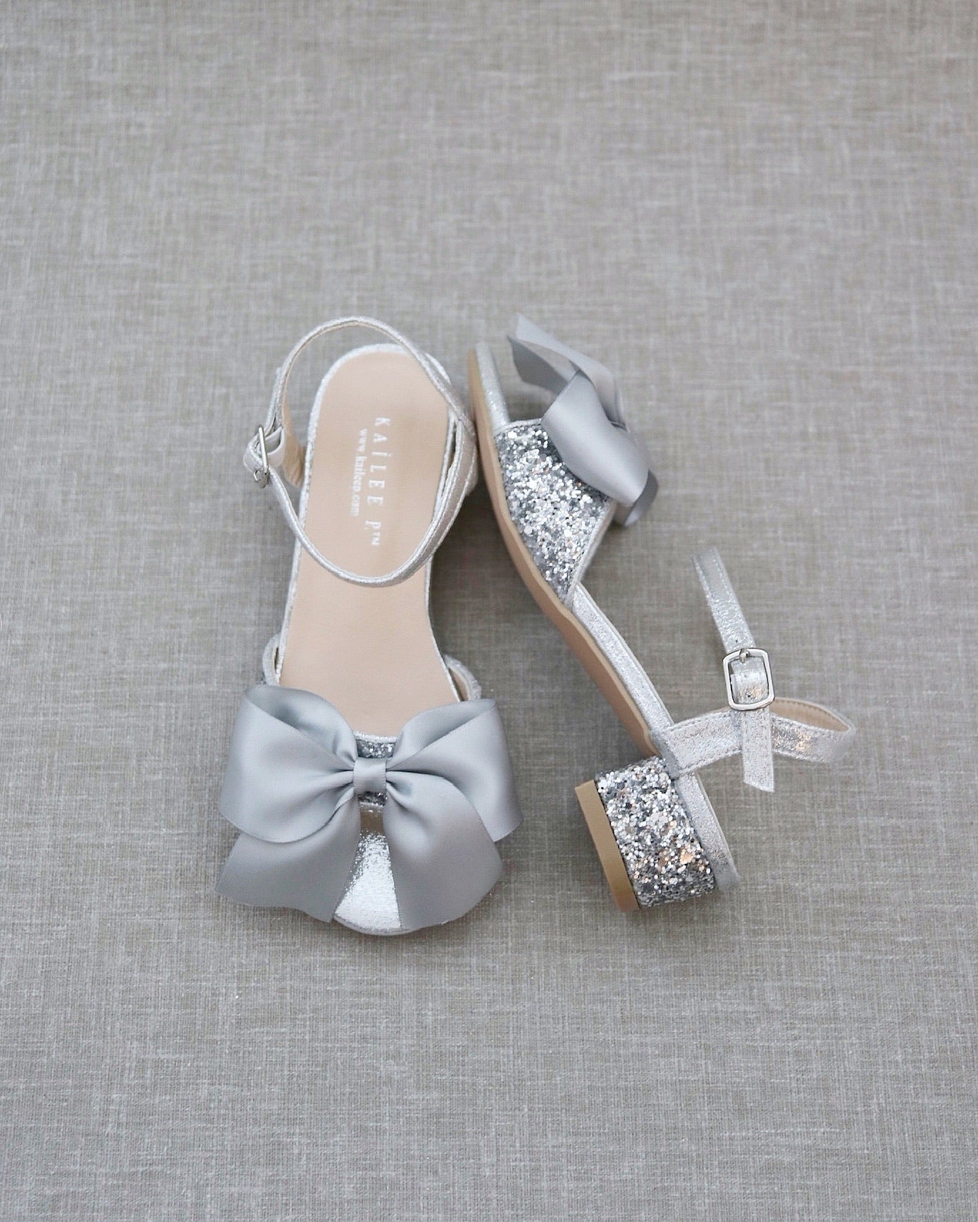 Mini girls silver bow mary jane shoes | River Island