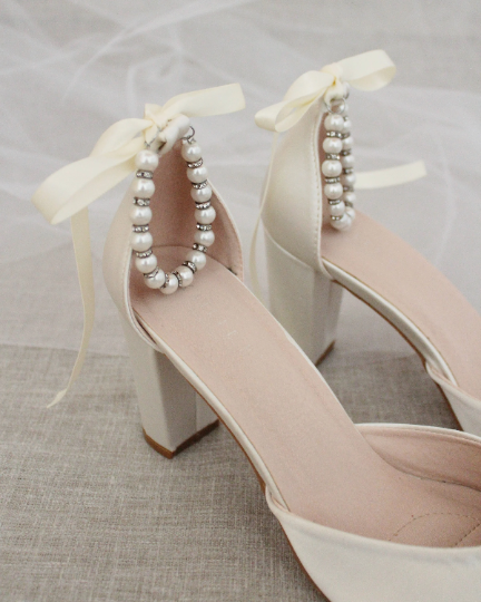 White shoes top with pearls